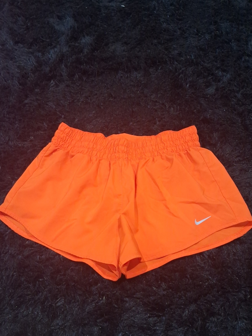 Nike Women's Bright Orange Athletic Shorts with White Swoosh